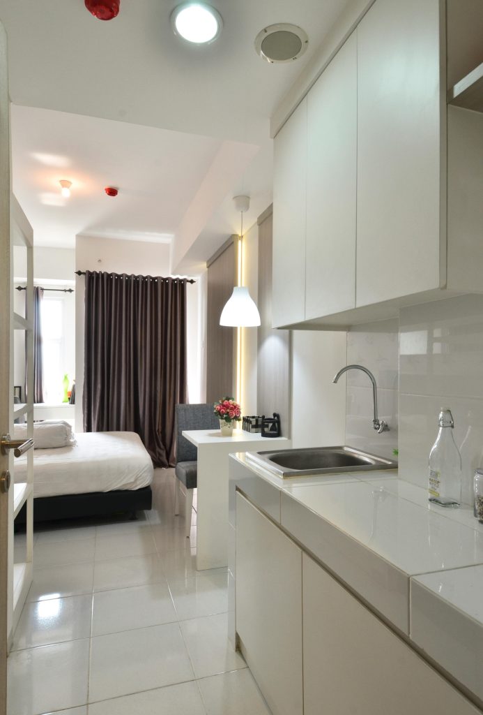 Explore a minimalist apartment interior featuring sleek design in Banten, Indonesia.